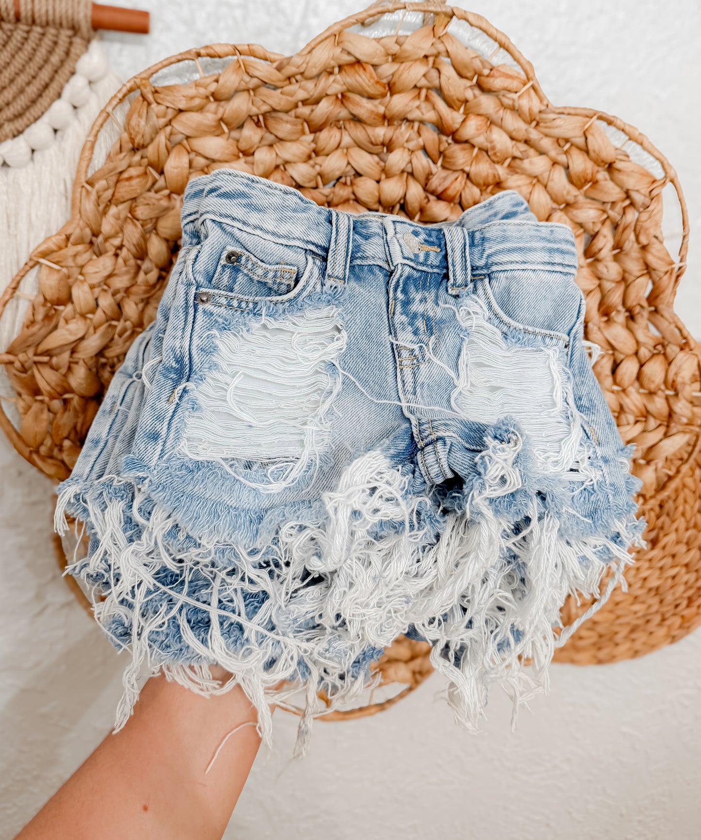 Light wash distressed shorties