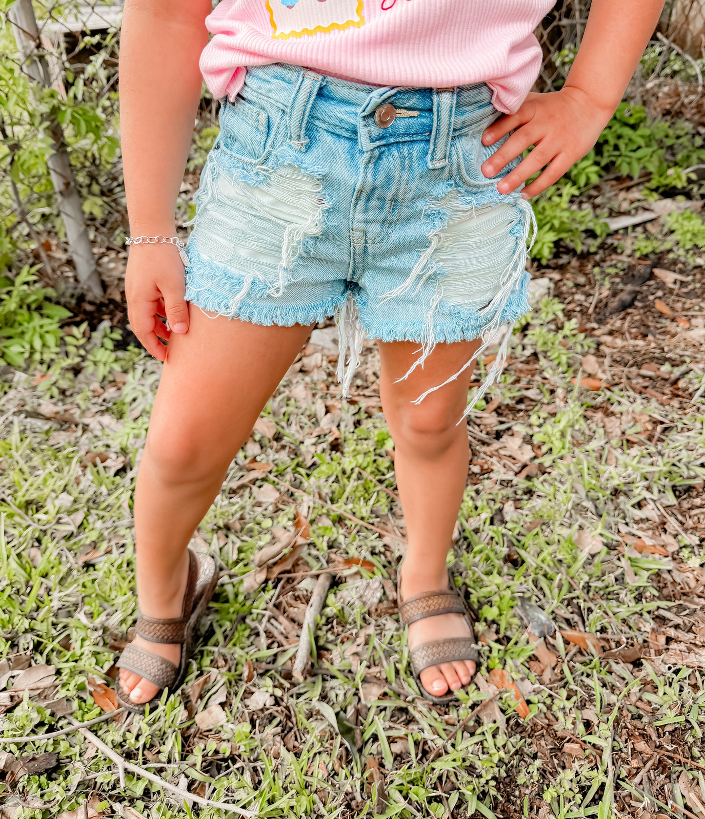 Light wash distressed shorties